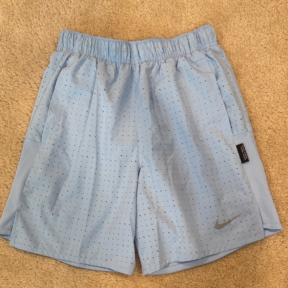 Nike Boy’s Light Blue Perforated Athletic Shorts with Swoosh